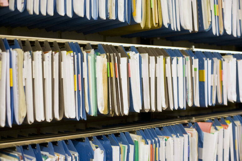 documents on a shelf